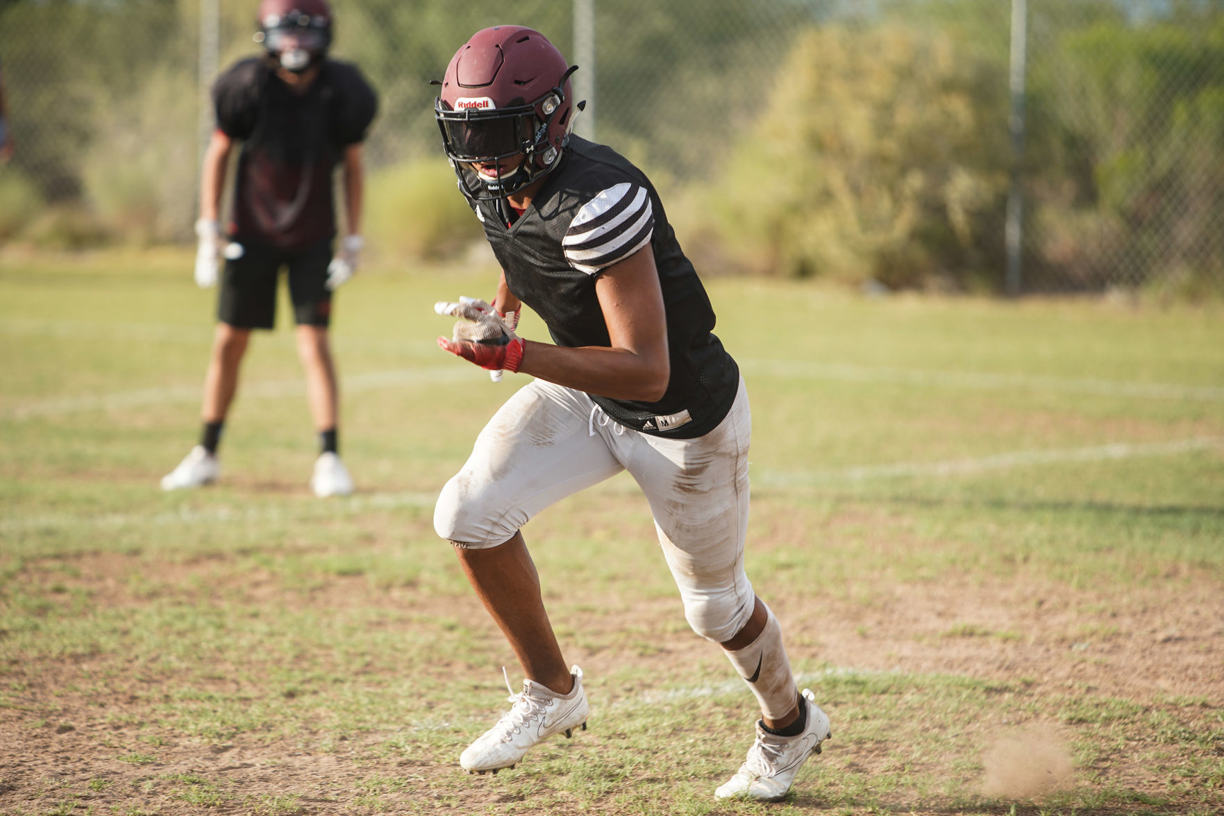 Walden Grove WR Jordan Lopez breaks off the line during offensi